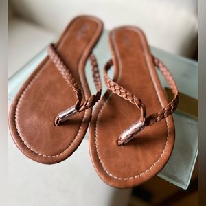 2/$15 … Tan flip flops - size 10